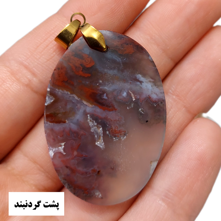 Polished oval agate gemstone from Khorasan with scenic natural inclusions
